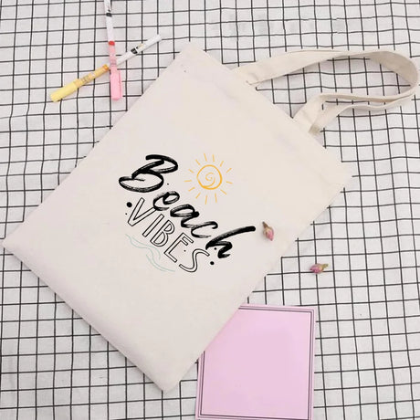 BYFT013985 BYFT Natural Cotton Flat Tote Bag Beach Vibes Design B.webp