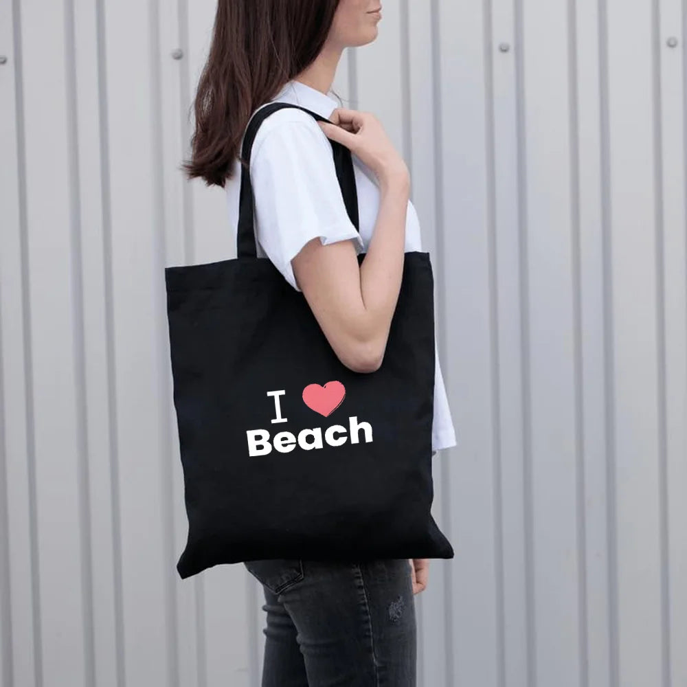 BYFT013991 BYFT Black Cotton Flat Tote Bag I Love Beach Design B.webp