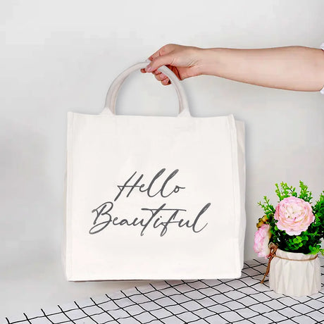 BYFT013998 BYFT Laminated Natural Canvas Bag Hello Beautiful Design C.webp