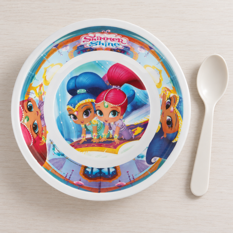 Nickelodeon Shimmer & Shine bowl on a light tabletop beside a white spoon